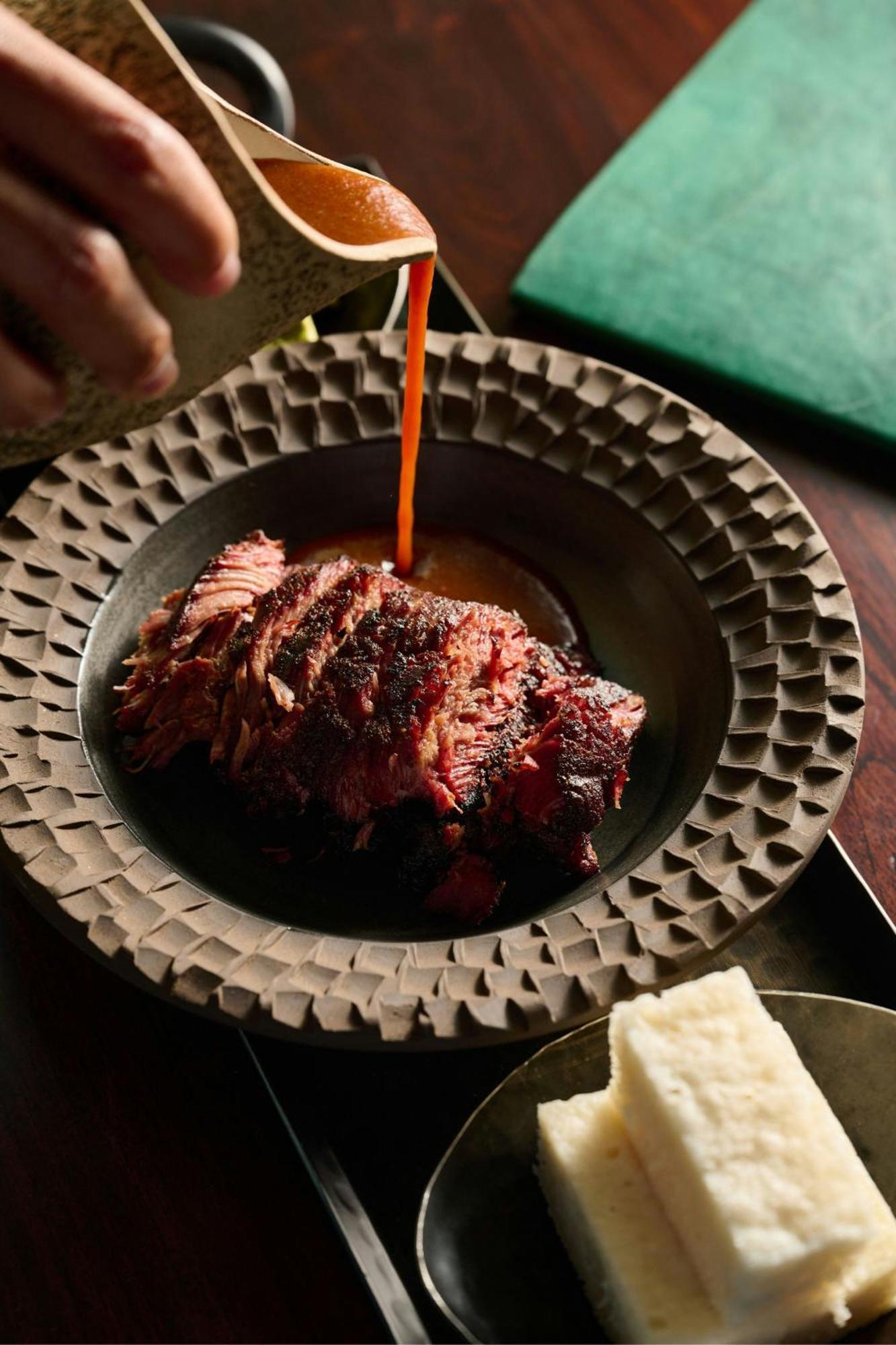 The Dubai Edition Zewnętrze zdjęcie A plate of grilled meat